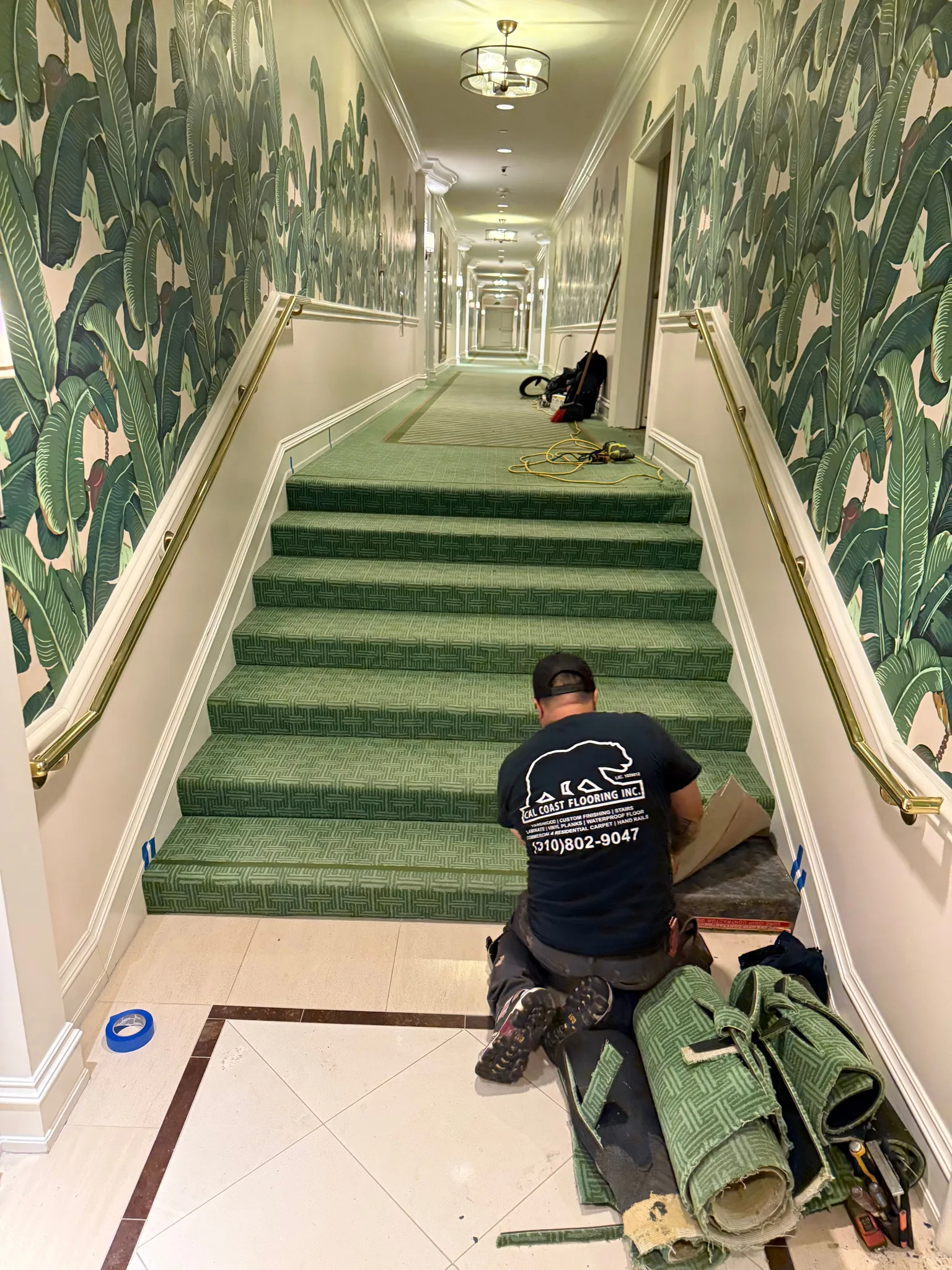 Wrapping up carpet install on stairs