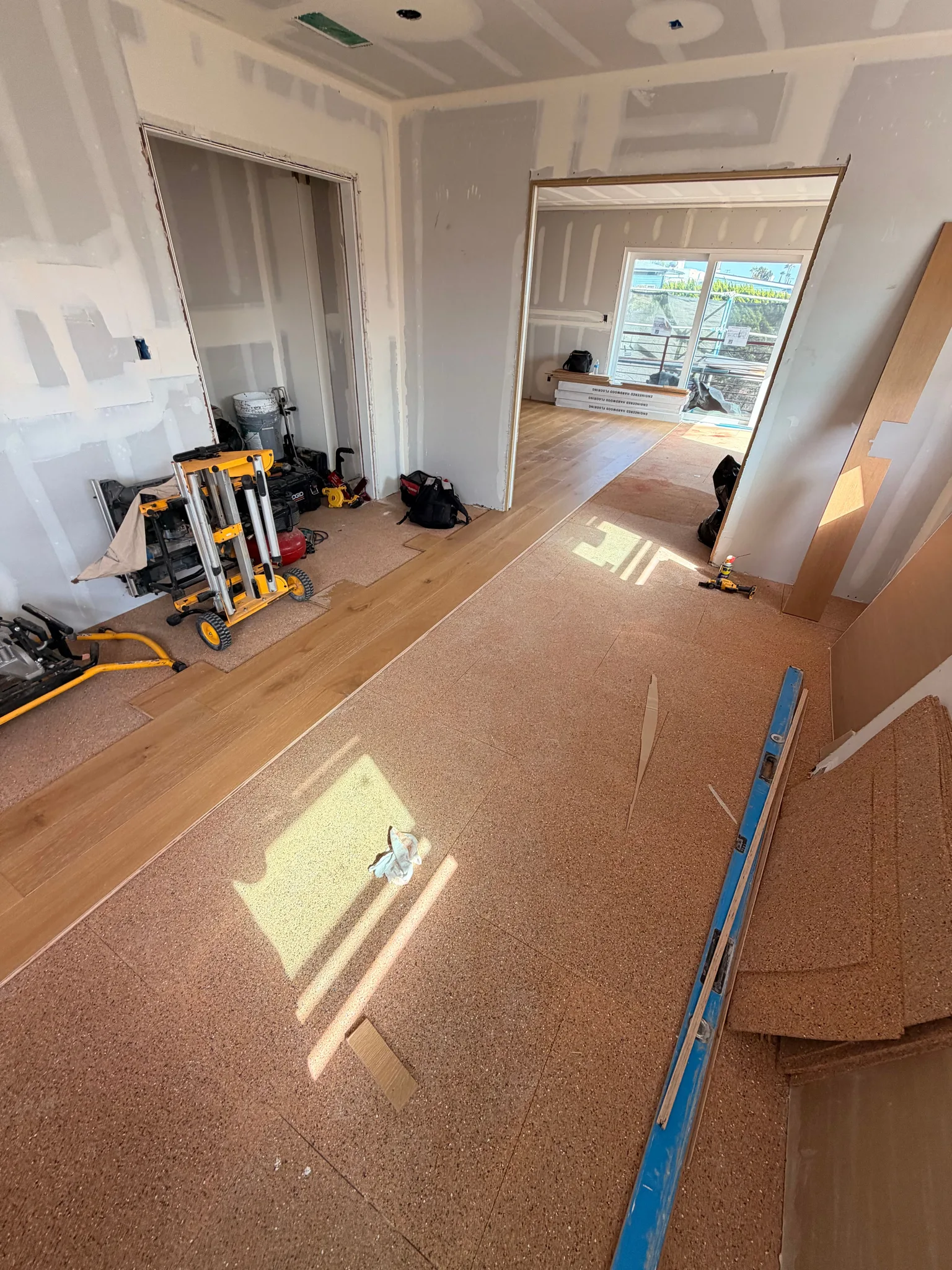 Oak planks going down over cork
