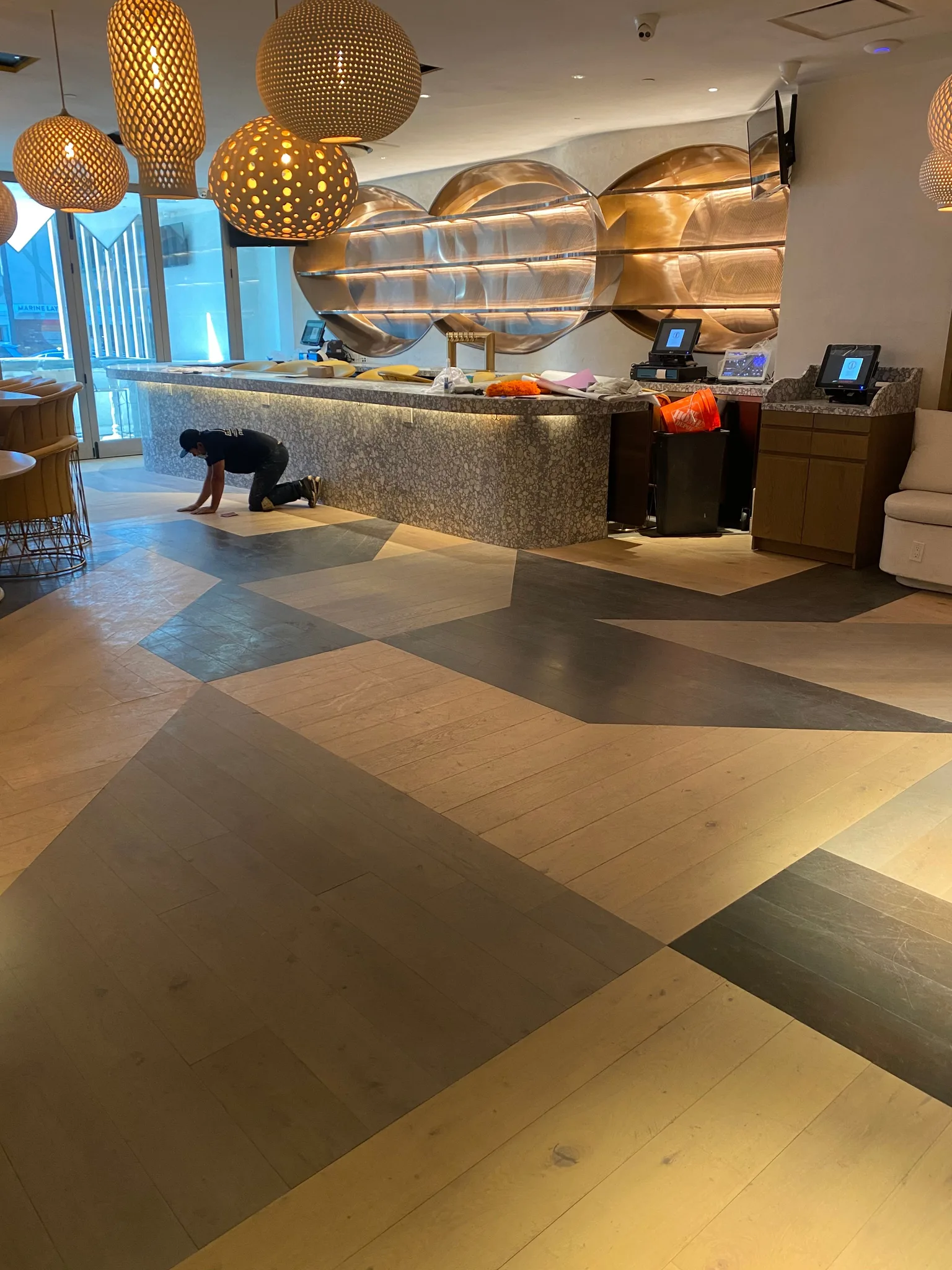 A one-off pattern floor that makes the bar the centerpiece
