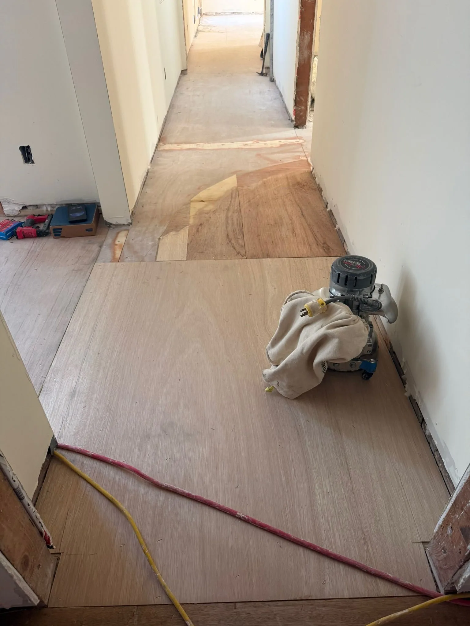 Plywood overlay sanded flush with the edger before flooring