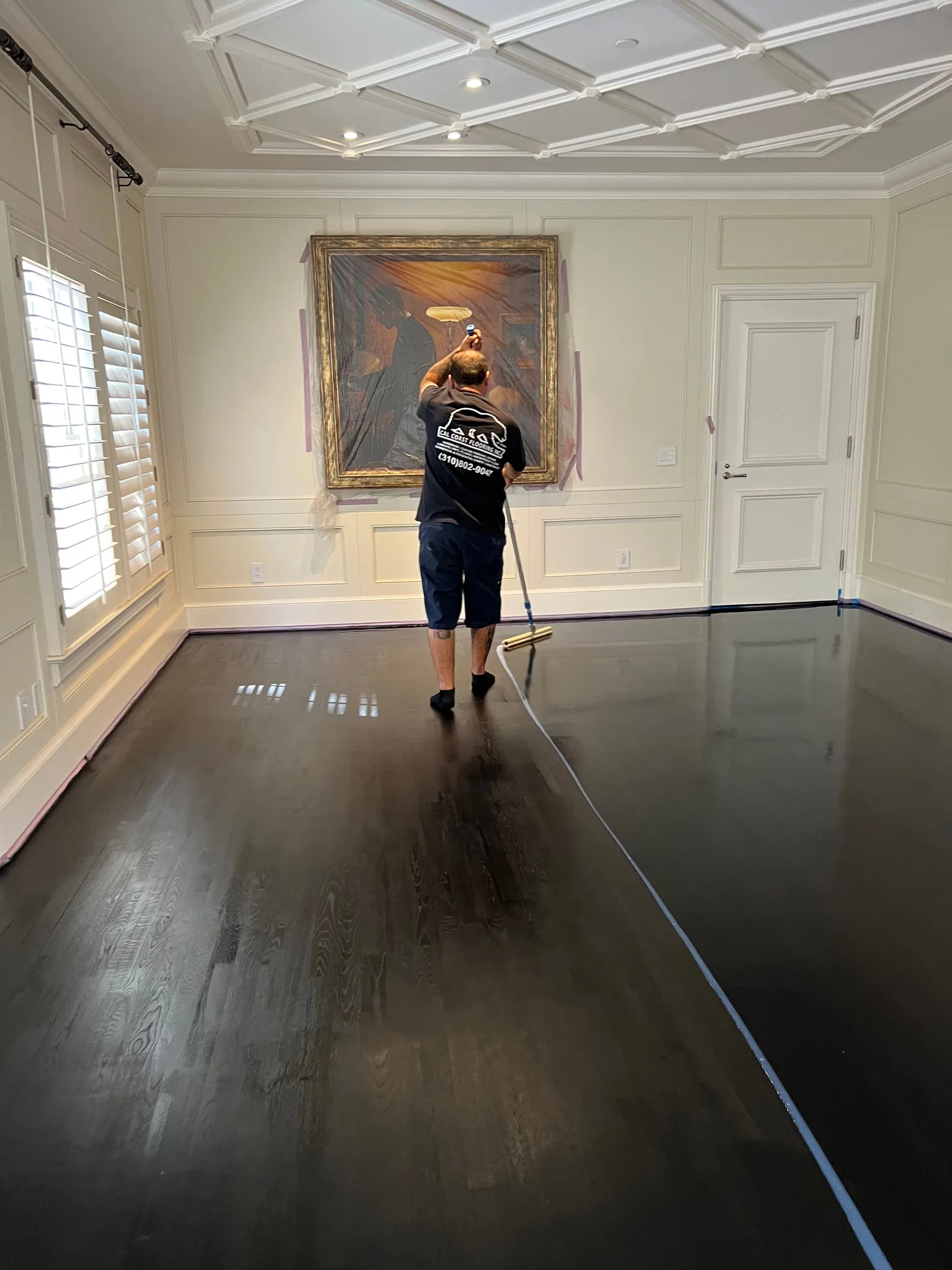 Applying finish to true black stained floor