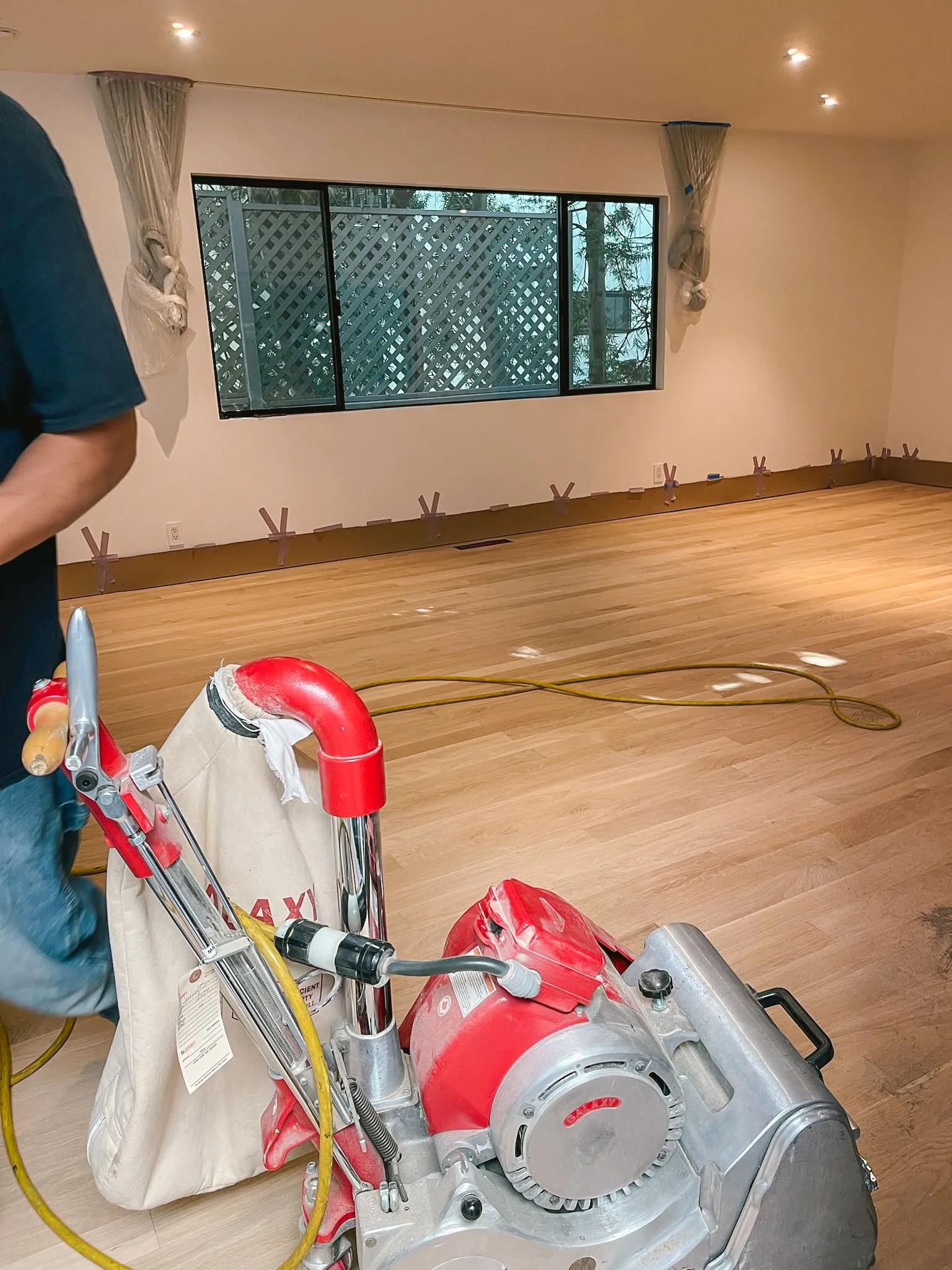Drum sander on a freshly sanded oak floor