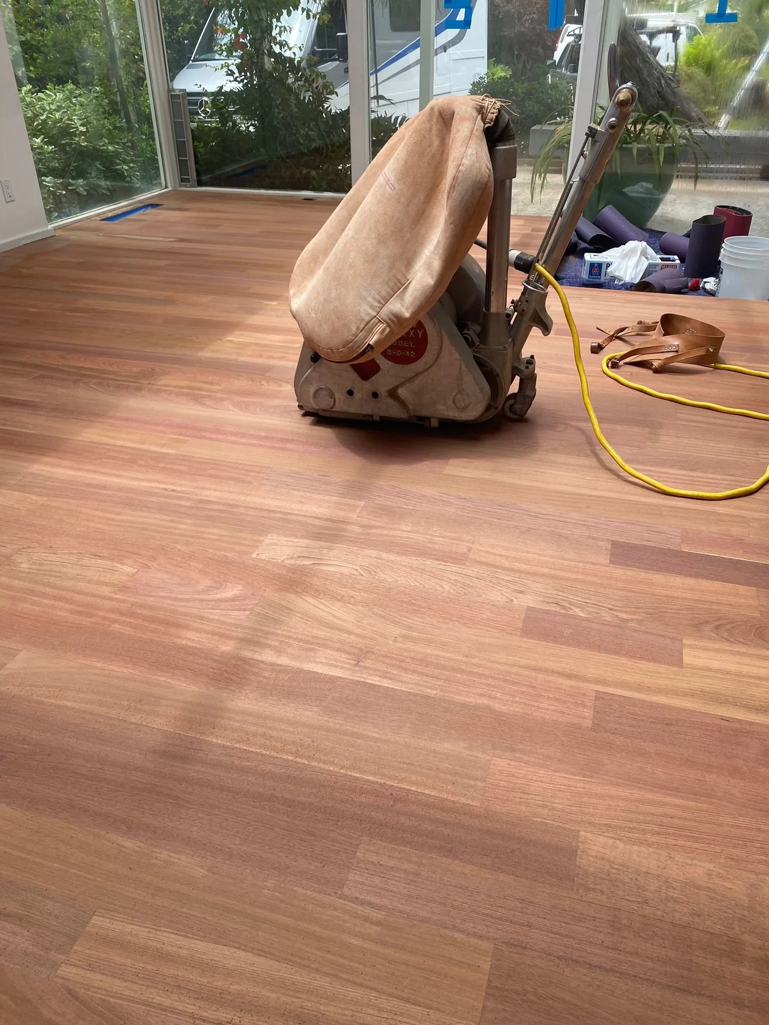 Red-toned hardwood sanded bare