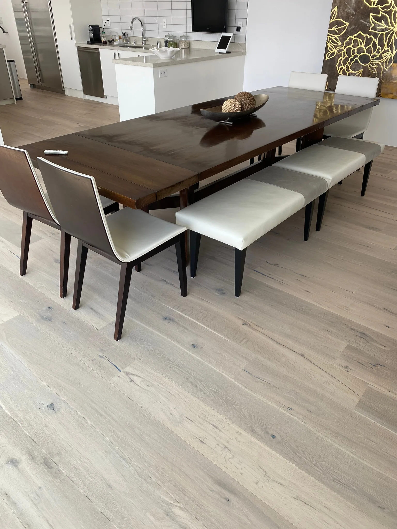 A lighter finish brightened the kitchen and dining area
