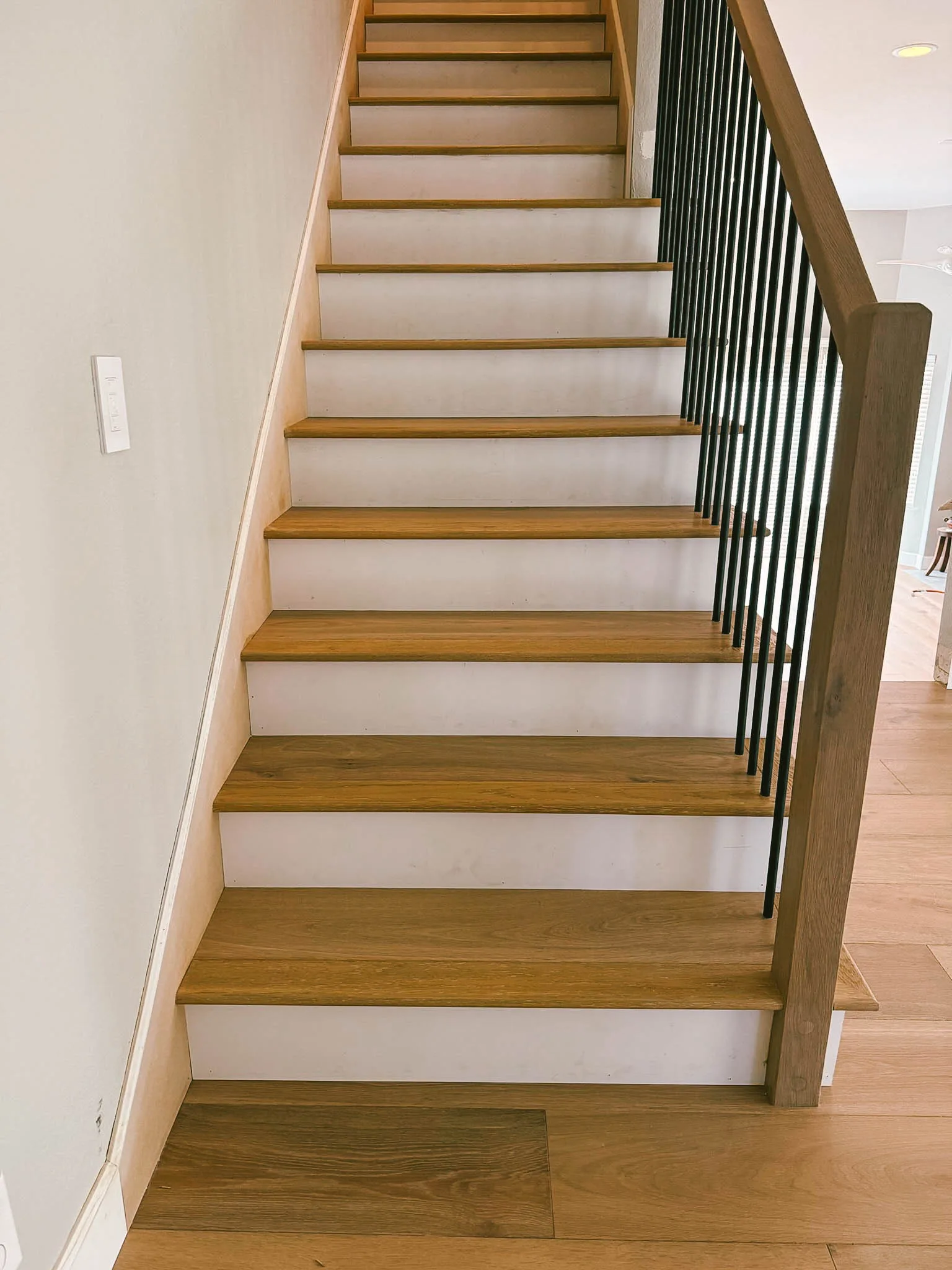 Oak treads, white risers and black balusters