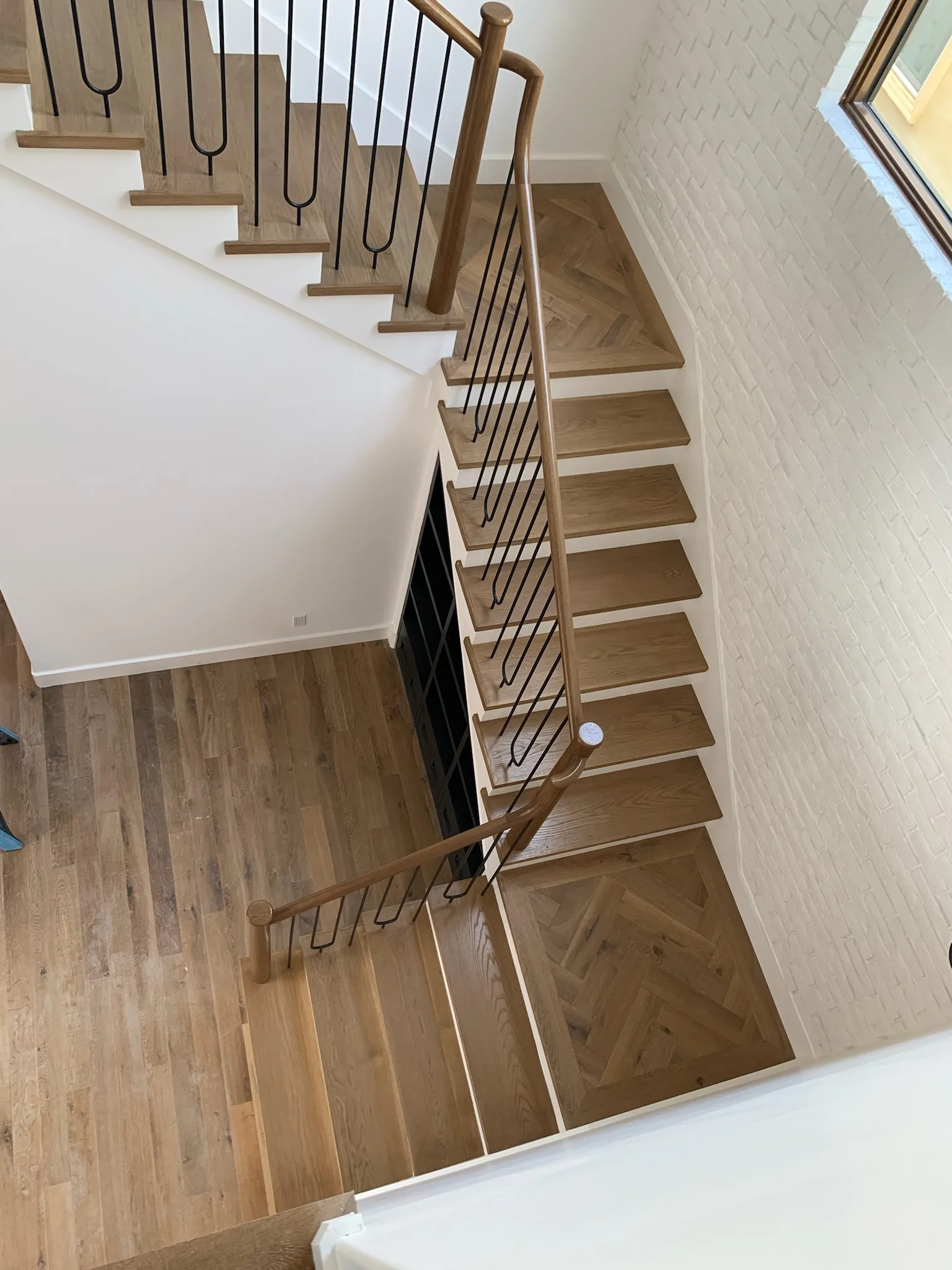 Herringbone landing with oak treads