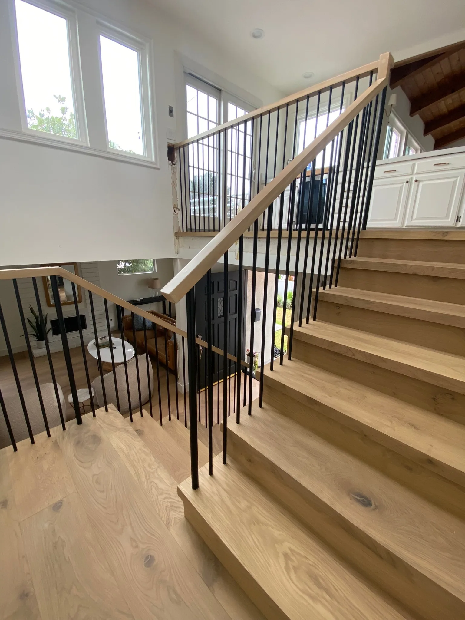 Oak treads and landing with black balusters