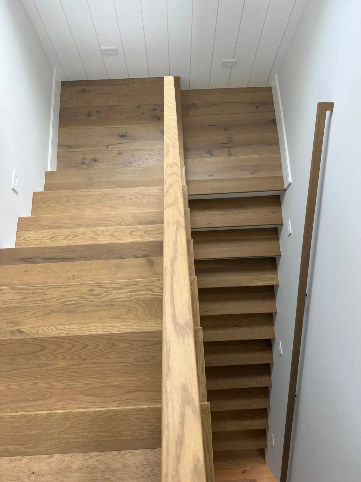 Oak treads switchback staircase