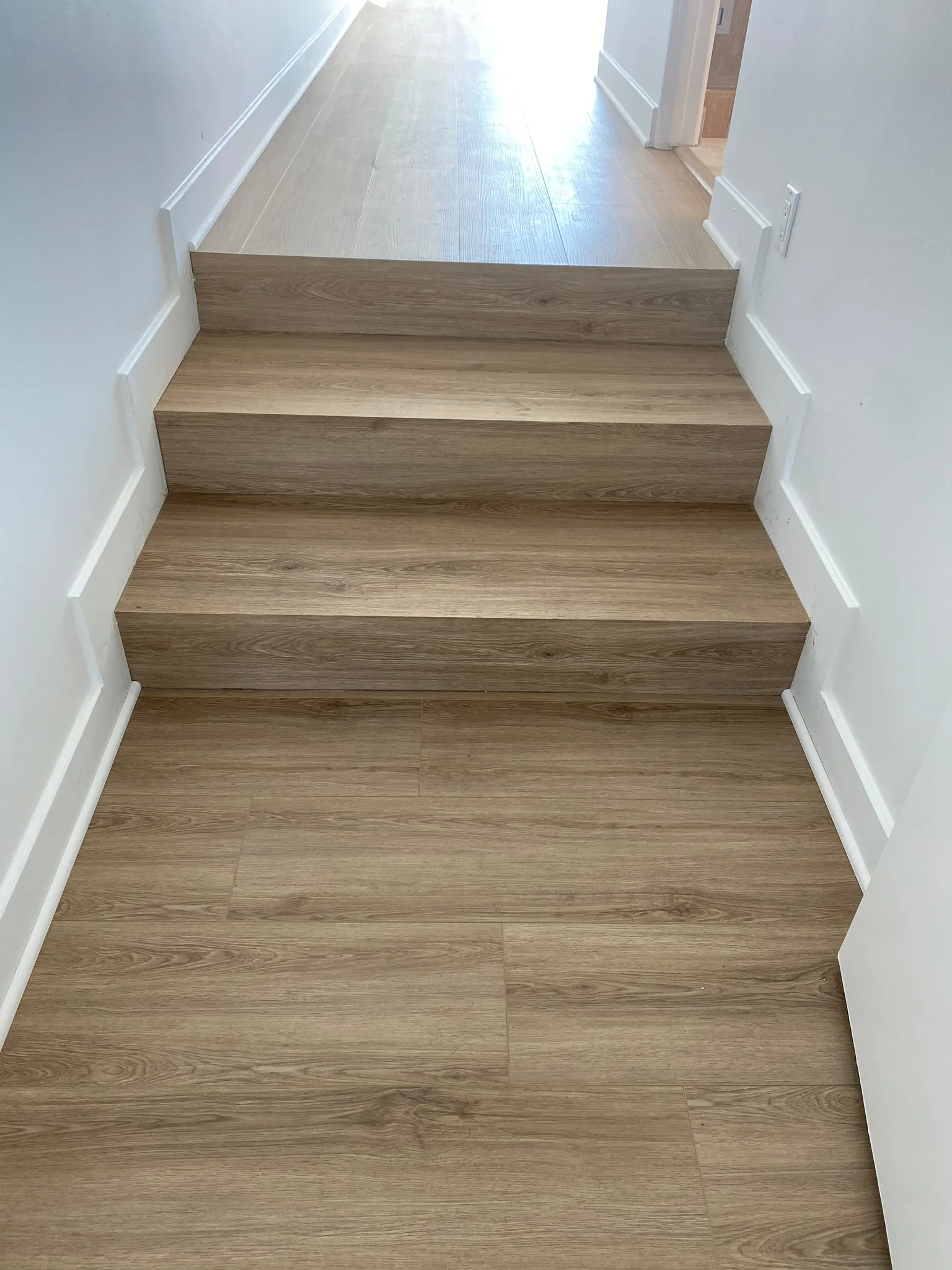 Stairs that match the floor, no transition strips
