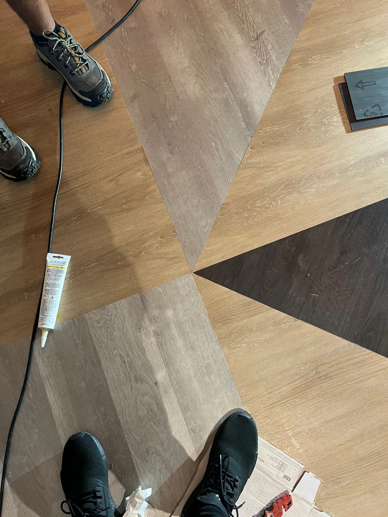 Glue down vinyl planks installed to custom pattern