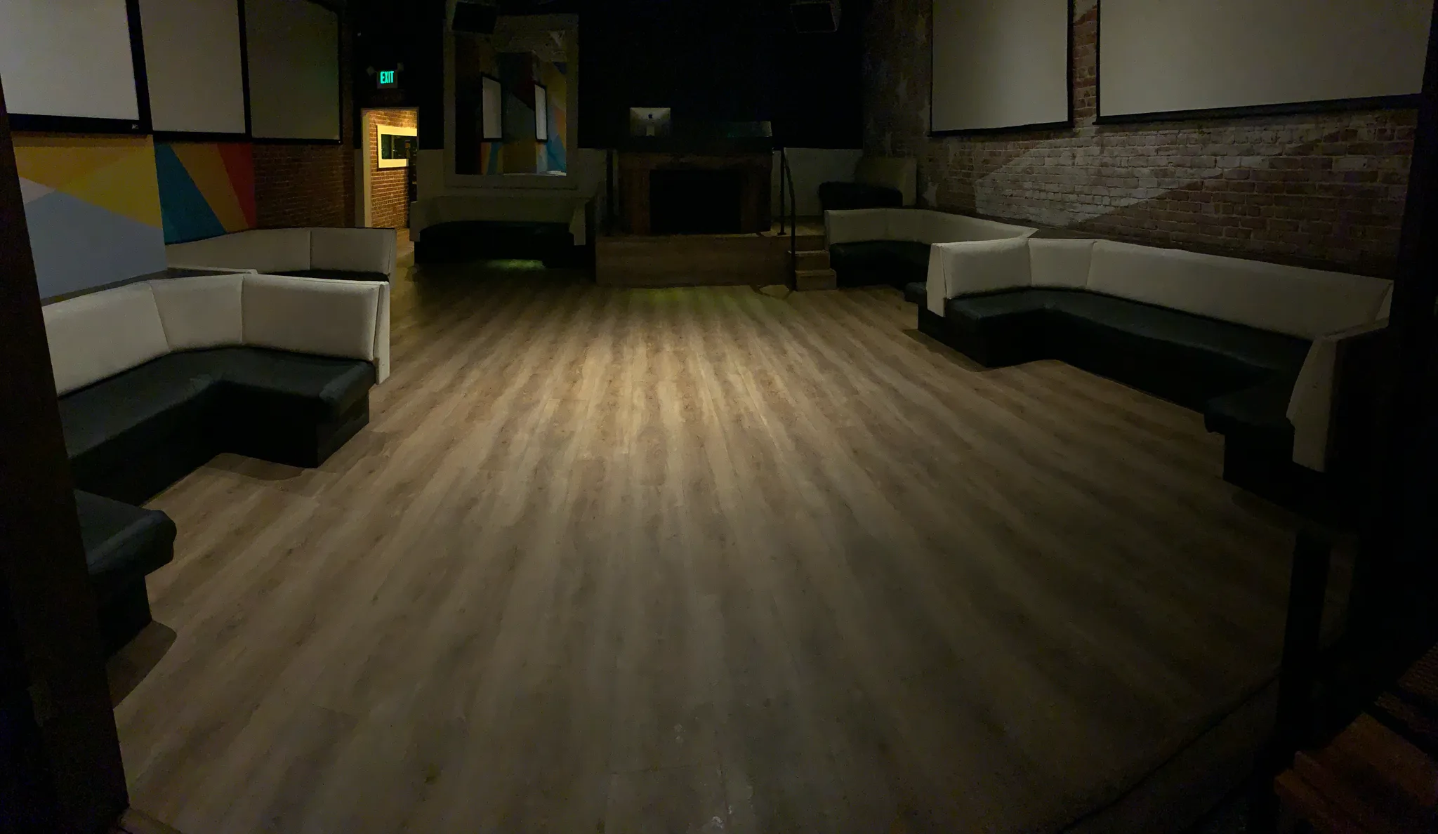 New luxury vinyl plank flooring by Cal Coast Flooring across the American Junkie lounge in Hermosa Beach