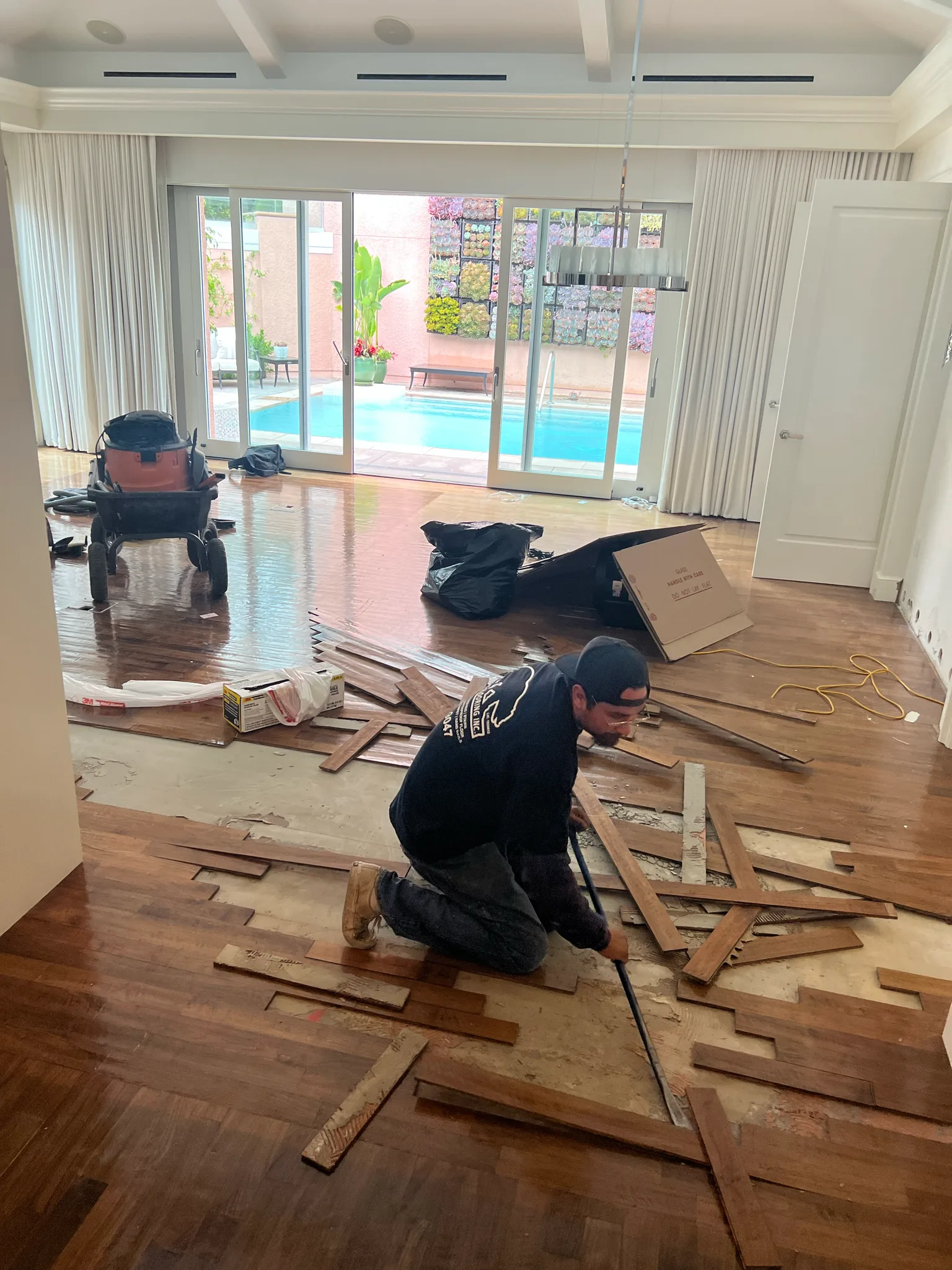 Work in progress: hardwood being removed in a poolside suite at The Beverly Hills Hotel