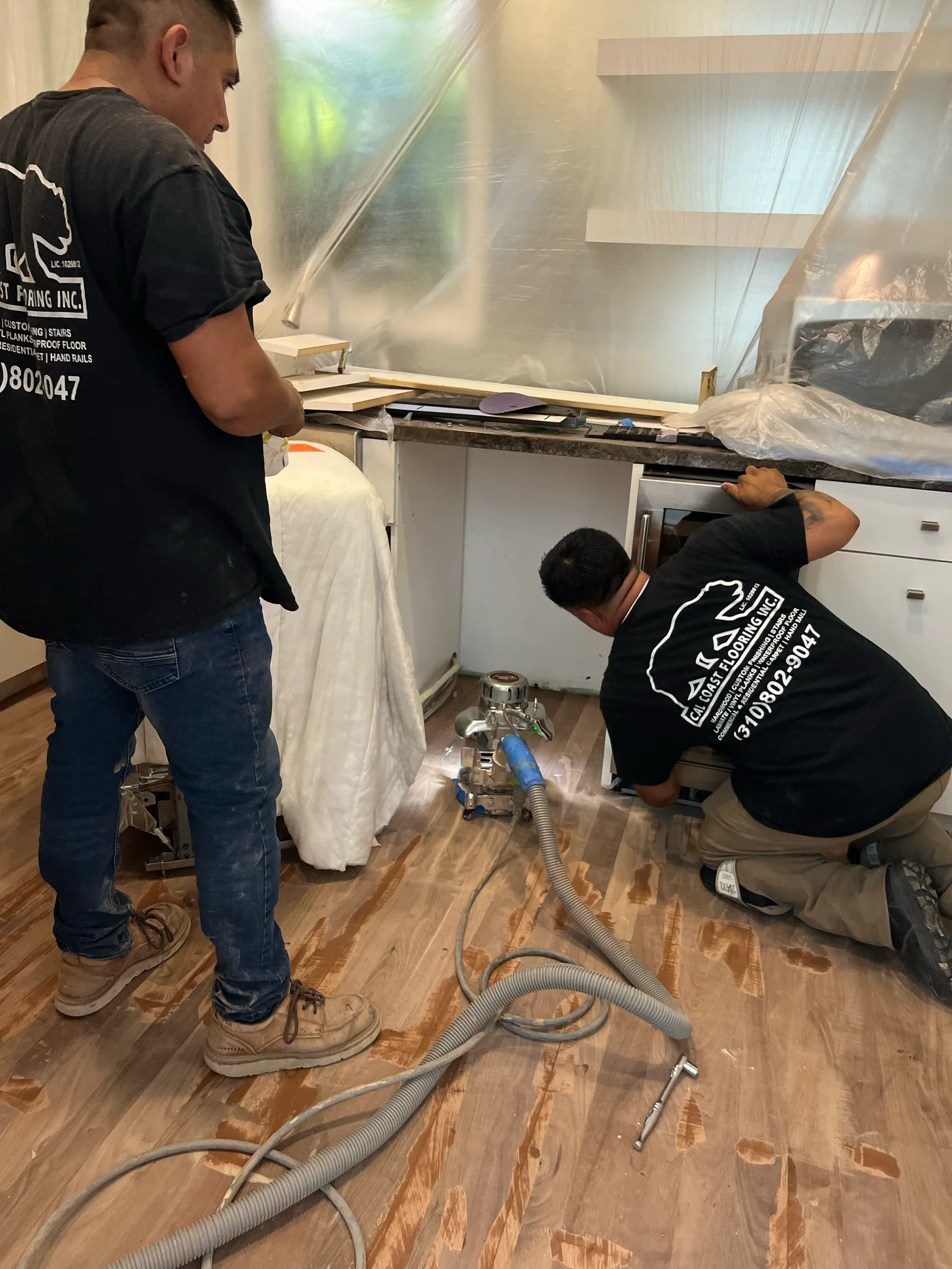 Work in progress: dust-contained hardwood repair in a kitchen at The Beverly Hills Hotel