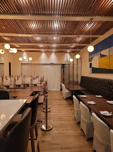 Finished dining room at Nando Trattoria in Manhattan Beach on the newly stained and finished hardwood floor by Cal Coast Flooring