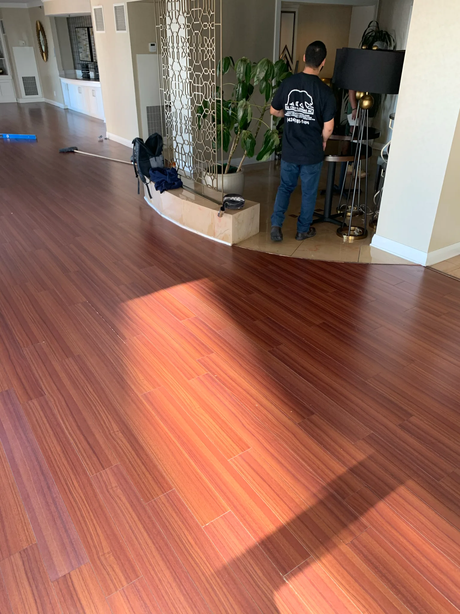 Richly grained wood plank flooring installed by Cal Coast Flooring in a lounge at Omni Los Angeles