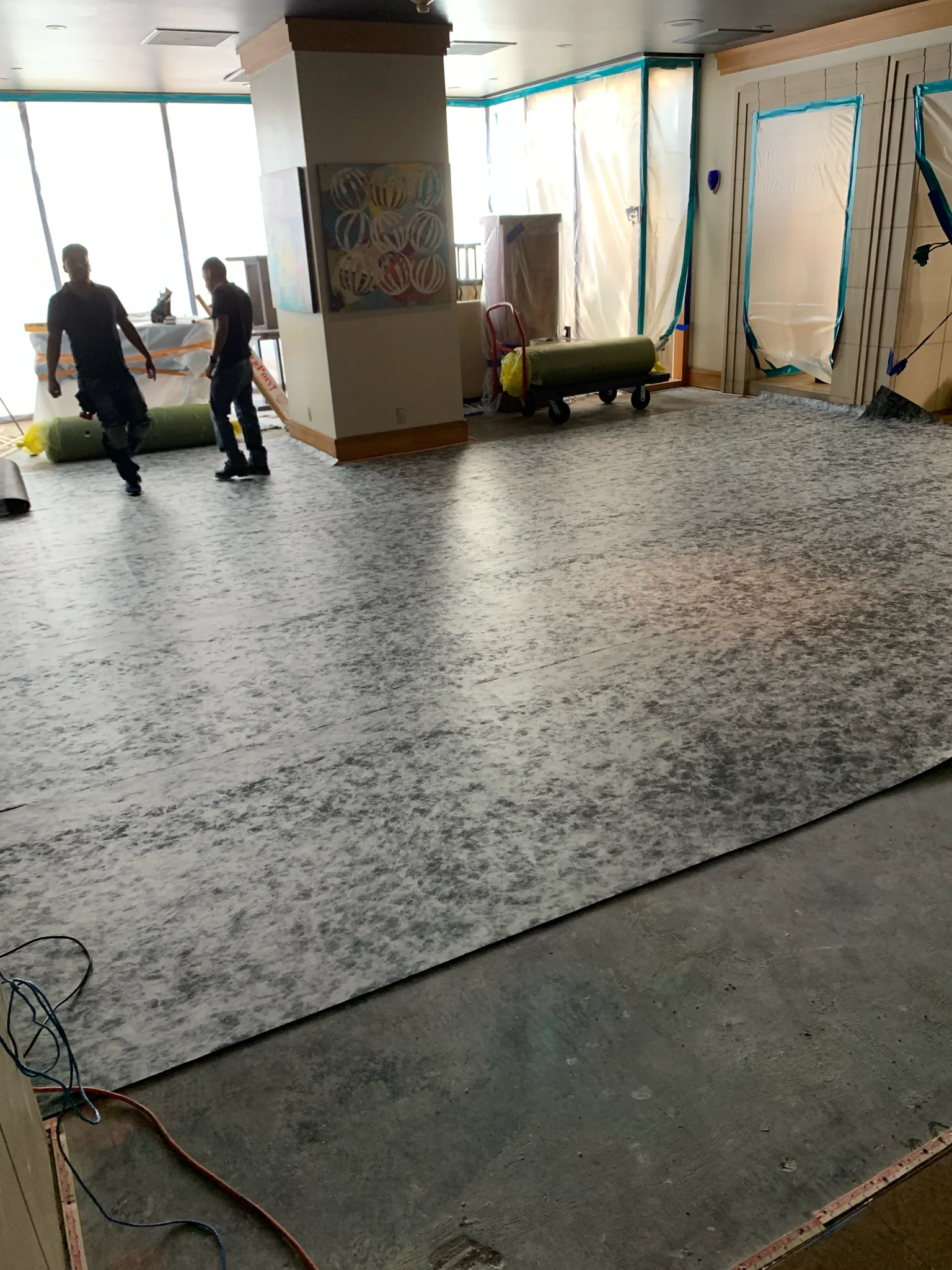 Work in progress: Cal Coast Flooring floor protection across an event room at Omni Los Angeles