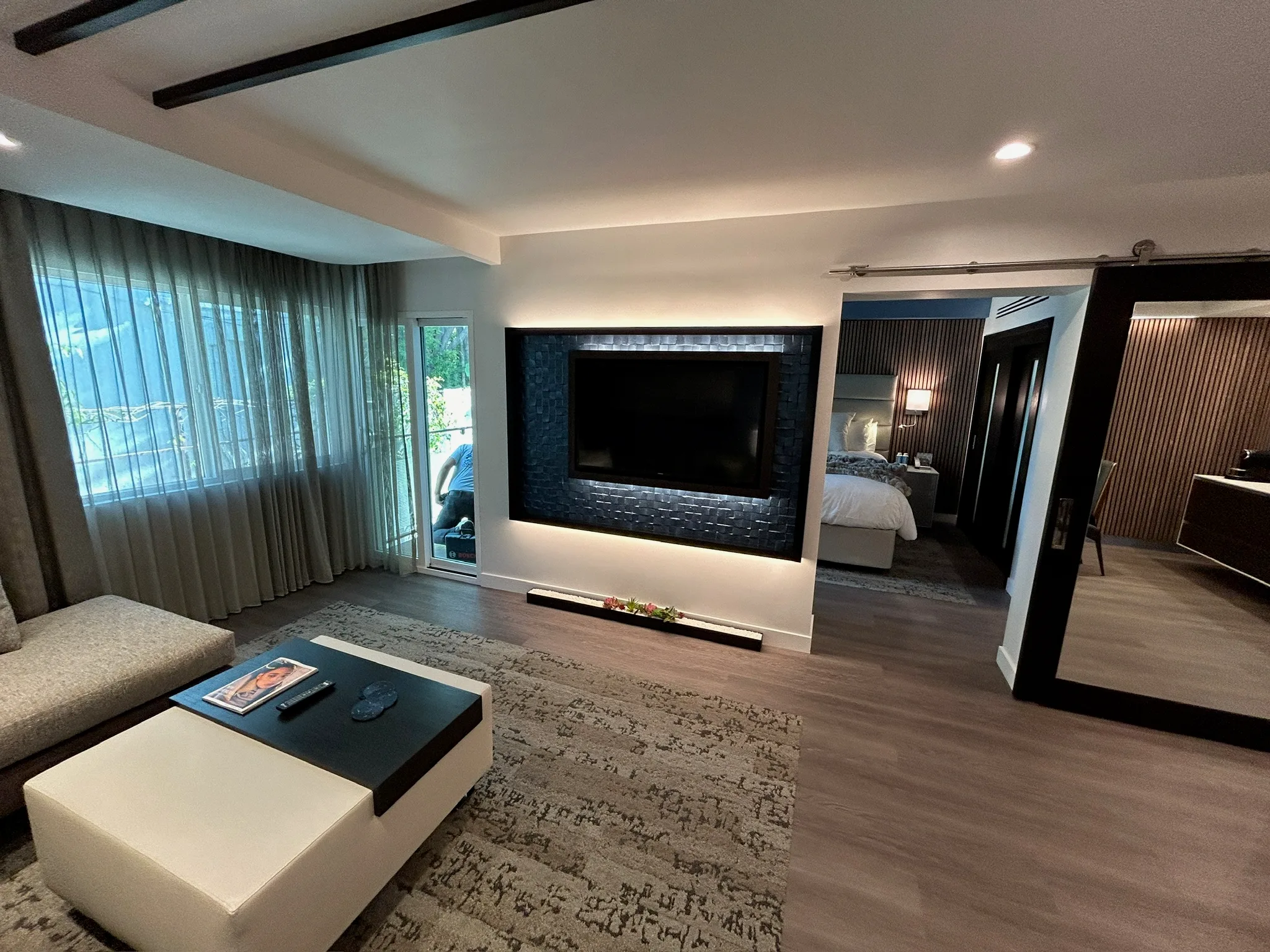 Plank flooring running from the suite living room into the bedroom at the Sunset Marquis, West Hollywood