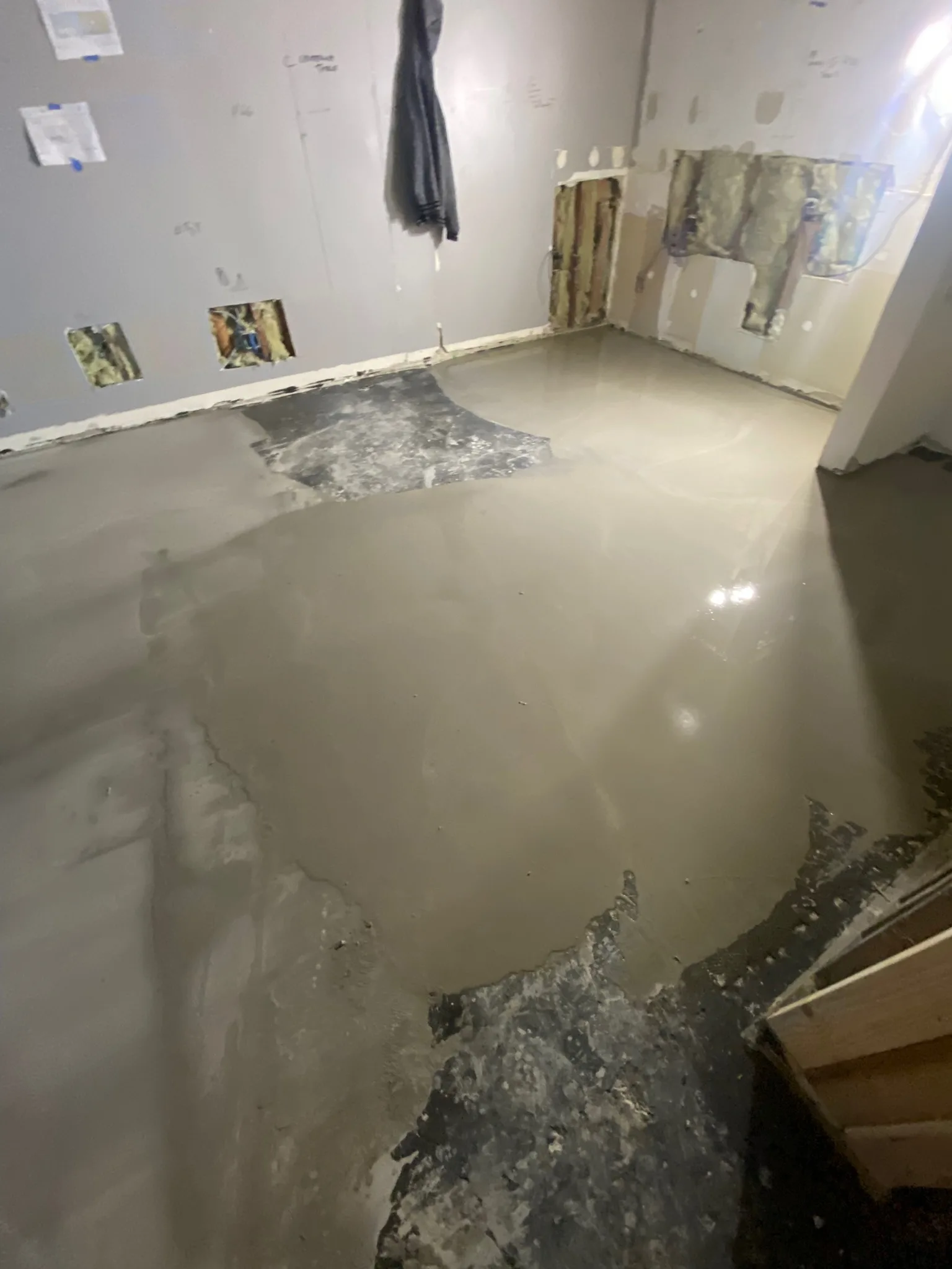 Leveling compound curing on the guest-room slab at the Sunset Marquis, part of the floor prep