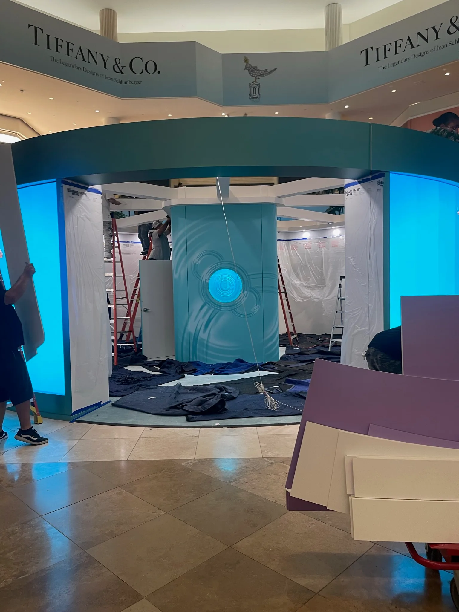 Tiffany & Co. pop-up pavilion mid-build beneath the store signage at South Coast Plaza