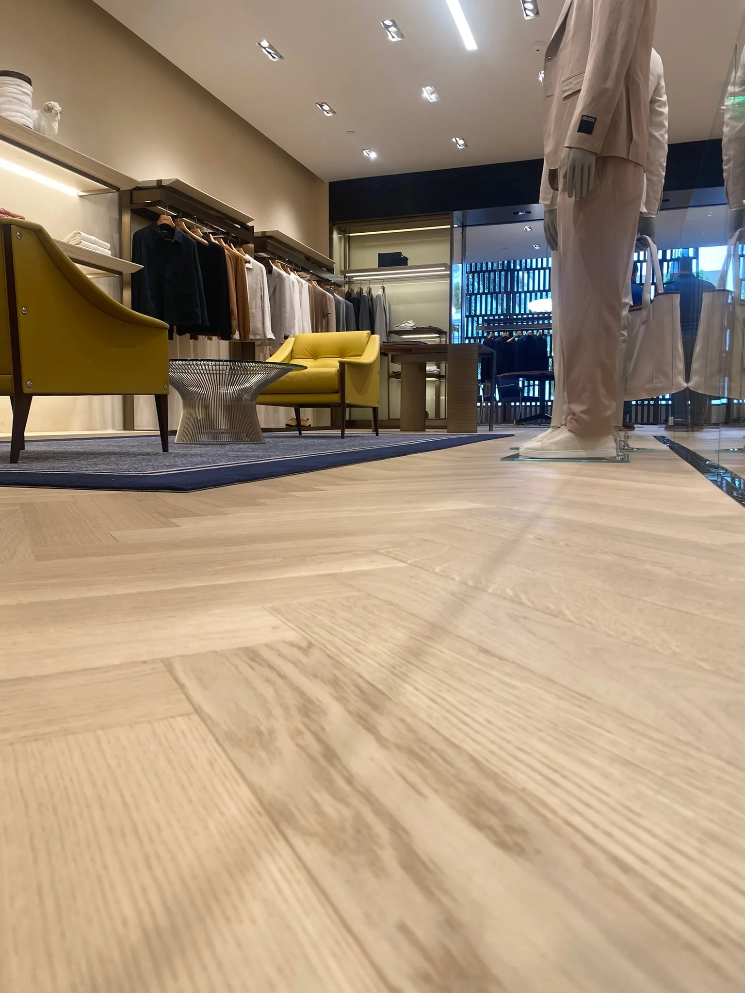 Grain detail of the light oak herringbone floor on the Zegna Beverly Hills salesfloor